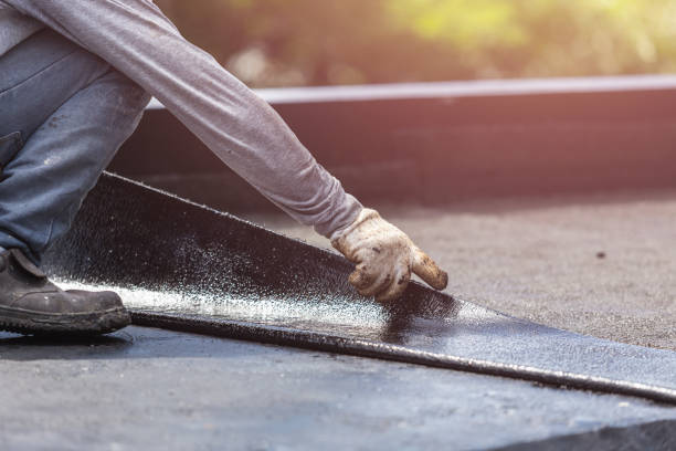 Professional Basement Waterproofing technician working in Keyport, NJ